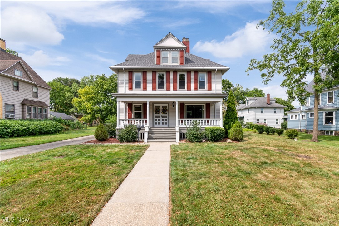 Step into timeless elegance at this stunning 1904 original colonial located on the iconic Broad Boulevard. Expertly renovated to preserve its historic charm while offering modern luxury, this home is a rare gem in the heart of Cuyahoga Falls just a 5-minute walk to the Falls and moments from downtown. No detail was overlooked in the thoughtful restoration of this classic residence. From the hand-crafted aluminum dental molding caps to the polished brass and copper door plates, every inch exudes craftsmanship and character. Inside, you’ll find: Gorgeous hardwood throughout with red oak floors in the kitchen. A working safe from the 1800's was built into the house at the time of the original construction. 10-foot ceilings on the main floor. A wood-crafted grand staircase and a wide secondary staircase leading to the attic. Original solid wood doors, wood trim accents, glass doorknobs, and crown molding in the dining room and bedrooms. Beautiful hand-carved mantle and solid wood columns framing the living room entry. A large picture window filling the living room with natural light. The completely renovated kitchen, featuring granite countertops, new refrigerator, stainless steel stove (5 years old), and a hidden gem—a maid’s stairwell to the kitchen and a dedicated maid’s pantry. Bathrooms have been fully updated with upscale finishes, including a custom walk-in shower. Do not miss the first-floor half bath with original wainscoting that blends old-world charm with modern elegance. Additional highlights include. Front porch swing overlooking Broad Blvd. Custom wood shutters and shades. Upgraded plumbing valves. New roof (2 years old). Detached two-car garage with a second-story loft—ideal for storage or a future apartment. Garage door opener included. English garden perfect for entertaining or peaceful relaxation. Don’t miss your chance to own one of Broad Boulevard’s architectural treasures. This home is a perfect blend of history, elegance, and location.