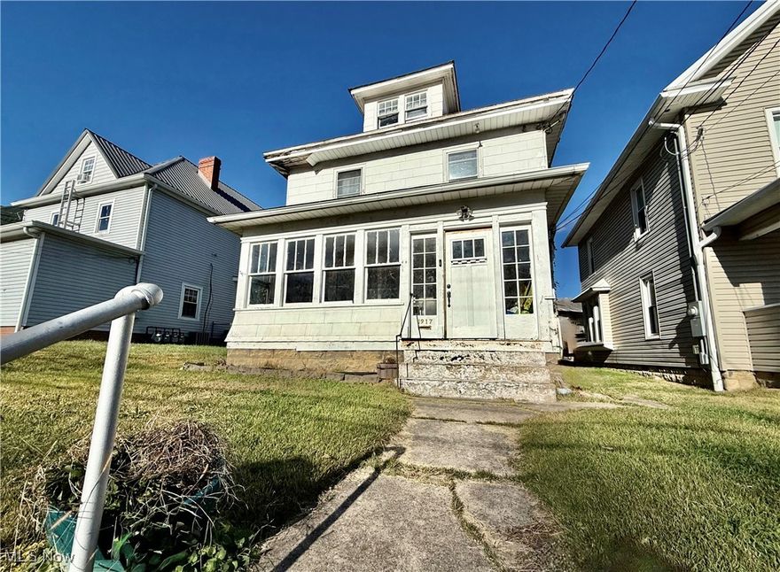 Looking for a home you can truly make your own at an affordable price? This 3—possibly 4—bedroom, 1.5-bath beauty features a large front sun porch, spacious interior, original hardwood floors, high ceilings, decorative fireplaces, and a wonderful window seat in the formal dining room. The oversized galley-style kitchen offers plenty of room to work and connects to a versatile bonus space that’s perfect for a small office, pantry, or additional storage. Off-street parking with a concrete pad is an added bonus! With a little TLC and some elbow grease, you can bring this home back to its full potential. Located just a short walk from City Park and other local conveniences, this property is priced to sell and ready for your personal touch.