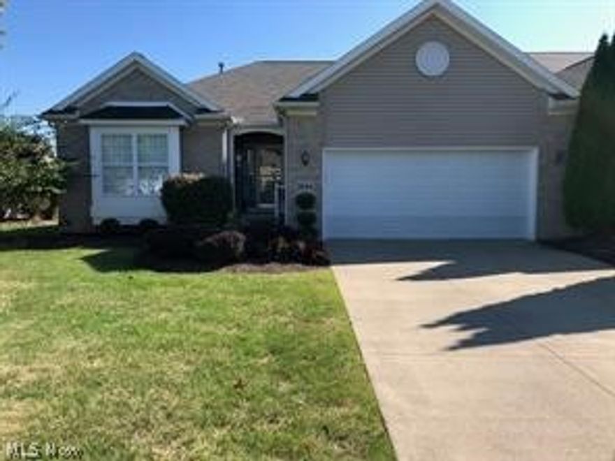 Welcome home to this beautiful 2 bedroom/ 2 bath ranch cluster home in Stratford Green surrounded by Mayfair County Club built in 2007* Upon entering you will see the light and bright open floor plan* Vaulted ceilings in the foyer with wood floors* Vaulted living room has a gas log fireplace, 2 sky lights, & patio door leading to deck to semi-private back yard* Retractable sun setter awning over trex-like deck which leads to patio* Dining room* Kitchen has a breakfast bar, black appliances (refrig, dishwasher, range, microwave & disposal) roll-out shelves and pantry* Vaulted master bedroom has a walk in closet with shelves and master bath with garden tub and separate shower* Guest bedroom & guest bath* Laundry room has sink and cupboards* Screen door from hallway to garage* Full 12 course basement with glass block windows & steel beams* 2 car garage with opener* Sprinkler system* A must see & just move in!