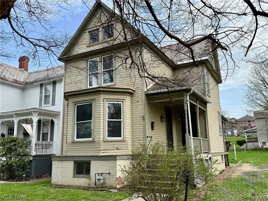 This 3 bedroom 2 full bath home in Marietta has so much potential for the enterprising individual.  It offers a large living room with bay window area, spacious dining room, updated kitchen with eating space and a full bath on the first floor.  The second floor features a large primary bedroom, with a spacious bedroom to the rear, a smaller third bedroom and another full bath.  The large walkout basement has lots of room for storage or a workshop area.    Due to a fire in the home next door years ago, this home experienced some damage which was repaired.  It was taken down to the interior studs and re-drywalled, new windows installed, new wiring, new lighting, new plumbing and all new ductwork.  With having two separate entrances from the front porch this has the potential to be a duplex with only a little modification.  Check it out and see the possibilities!