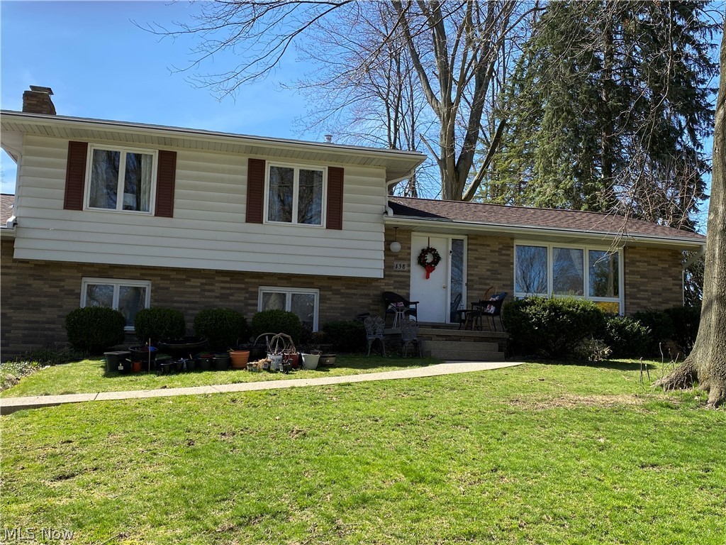 Well-maintained split level in quiet neighborhood. Large living room open to dining room with sliders to enclosed porch, eat-in kitchen. Upper level has 3 bedrooms and full bathroom. Lower level has office or possible 4th bedroom with full bathroom, fireplaced family room, mud room to attached 2-car garage. Unfinished basement with laundry and mechanics. Private backyard looks over green space and new schools.