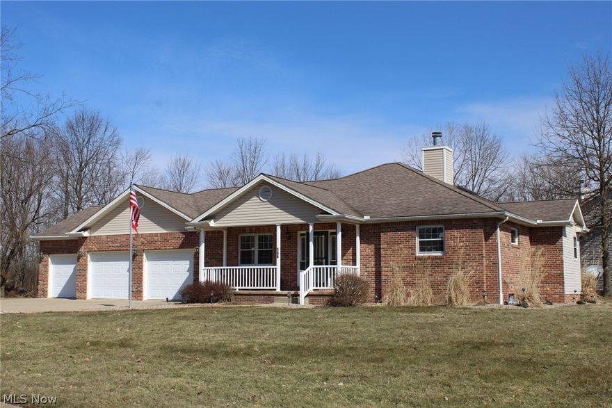 Beautiful ranch home in Marlington. Open floor plan. Fireplace in living room, 3 bedrooms. Spacious master bedroom with large bath and walk in closet. Attractive kitchen with granite counters and range/oven, refrigerator, dishwasher, microwave, trash compactor. First floor laundry with appliances. Granite counters in all baths. Deck off dining area to private fenced rear yard. 3 car attached garage. Full basement. Furnace new in 2018, air conditioning 2017. New insta heat hot water heater. New flooring thru out  2017. Gas $75.00 Electric $96.00.