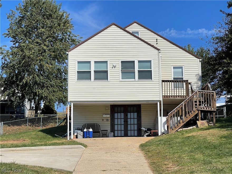 Nicely renovated raised ranch in the heart of Vienna. In 2018, the property was upgraded with a metal roof, a gas furnace, central air conditioning, a range, a refrigerator, and a 200 amp electrical system. Recent renovations include the addition of a new recreation room and a full bathroom on the lower level. Other recent renovations include the barn door, double exterior doors, utility tub, flooring, fixtures, switches, kitchen countertops, kitchen sink, dishwasher, thermostat, and deadbolt. The main level full bathroom also underwent a complete remodel. Additionally, chain link fencing has been installed around the rear yard and new front siding. Kids outdoor play equipment stays.
