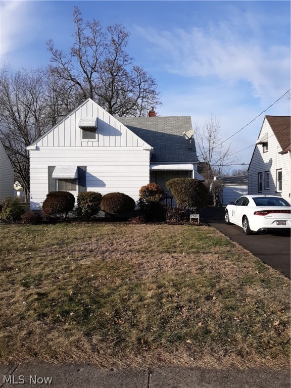 Newer carpet throughout & newer tile in the hallway. Dining area has large storage area. Finished basement with bar. 2 Car Garage. Enclosed porch - Nice size yard - Central Air!