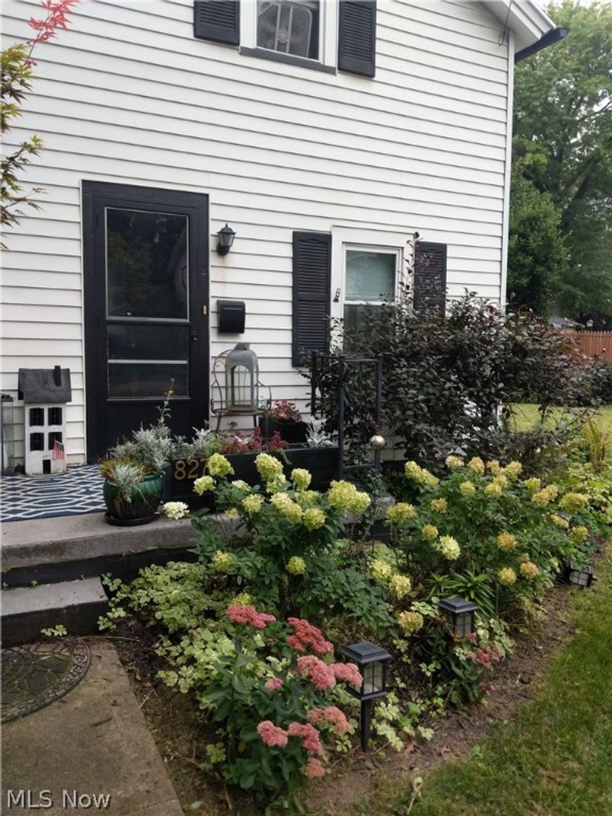 Welcome  to 827-9th St.! Lovely Century Home w/tons of charm and character that's situated on a parcel and a half, offering extra space in the City. This 4 bedroom, 2 bath home also offers an "In-Law Suite" on the first floor, which can also be used as your first floor Master, or it could be used as an efficiency rental since it has its own separate entrance. So many possibilities! Upon entering, you're greeted by rustic charm w/the original hardwood floors. The kitchen has some updates but resonates with Country charm. Off the kitchen, is an adorable screened-in porch that overlooks your private deck & spacious back yard. A full bath w/laundry hook-up completes the first floor so everything is first floor living. Upstairs, you'll find two amazingly large bedrooms and one smaller one that can be used as a third bedroom/office. The two-car garage and outbuilding complete the package. Don't miss your opportunity!