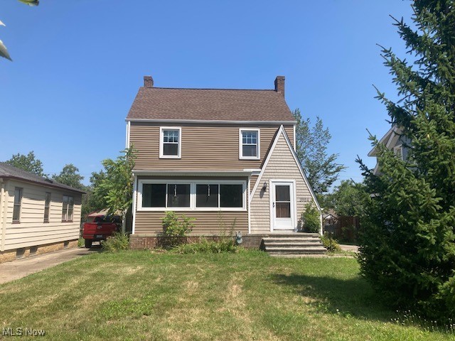 Beautiful Classic Colonial with Oversized 2 Car Garage. The Garage Features a Brand New Overhead Door and a Workshop Addition Off the Back. The Driveway is Extra Wide in the Back for Extra Parking ~ Potentially a Car Lover's Dream! Backyard Shed is Built Onto the Garage. Nice Kitchen with Breakfast Bar and Ceramic Floors. The Beautiful Dining Room Offers Gorgeous Hardwood Floors, Crown Molding and Built-In Curio Cabinets and Opens Out to a Beautiful Sunroom. The Sunroom Features Loads of Natural Light, Beautiful Ceramic Floors and Stone Tile Accent Wall! Again, Natural Wood Floors, Crown Moldings and Fireplace Highlight the Spacious Living Room. Upstairs You Will Find 3 Ample Carpeted Bedrooms and an Office. The Full Bath has been Beautifully Remodeled. The Basement Rec Room Awaits Your Personal Touches and is Enhanced by a Completely Remodeled Full Bath With Step-In Shower. Brand New Furnace and Air Was Just Installed. The Roof, Vinyl Windows and Vinyl Siding all Appear Newer. This Is a Great Place to Call Home!!