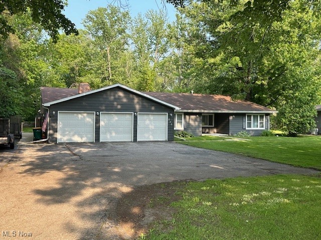 Spacious 4 bedroom 4 full bath ranch centrally located in Madison. This house has a large 3 car attached garage with plenty of outside parking as well. It has a 19 x 29 family room with a wood burning fireplace, a separate dining room, nice size living room, huge laundry room, and all the appliances stay. The 4th bedroom and bathroom were added in 2017. It sits on just over 1 acre. Outside there is a nice deck with pergola and a screened patio. The central air was installed in 2022, and the hot water tank was replaced in 2023.