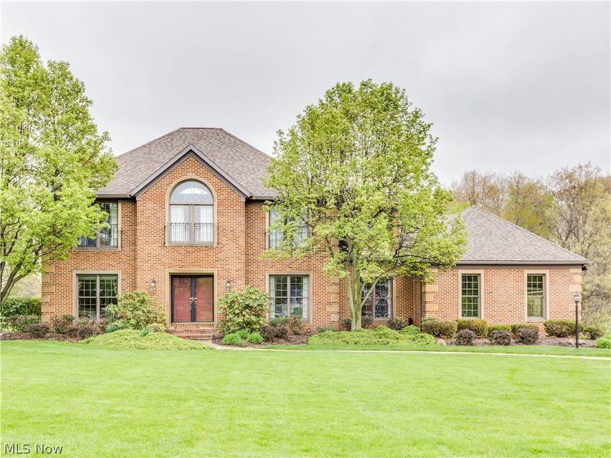 Truly an outstanding quality built 4 bedroom, 2.5 bath one owner colonial in Mayfair Estates with approx. 3518SF (main level & up), custom Schrock cabinets throughout, 9' ceilings (volume ceiling in Great room with skylights) extra wide crown molding & trim, 6 panel doors, granite counter tops, wood floors (foyer, formal dining & eat in kitchen), approx. 3/4 brick exterior, 17x12 screened porch, 3 car side load garage & gorgeous 1.06 acre lot with pond view & backs up to golf course* 2 story foyer* 1st floor den with built in cabinets* Great room with brick gas log fireplace, wainscoting, 3 sky lights, enclosed wet bar with refrig, window wall & atrium doors to screened porch* Eat in applianced kitchen with pantry, roll outs, desk & access to screened porch* 1st floor laundry with cupboards & built in ironing board plus a mud room* Master with access to balcony, walk in closet & master bath with double vanity, garden tub & oversized shower* Bedroom #2 with access to balcony & double cl