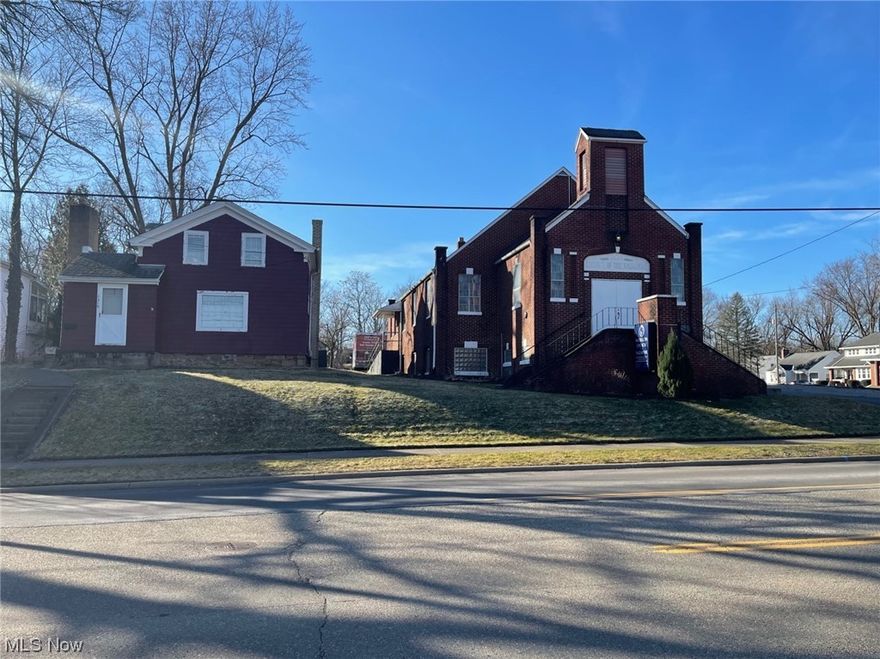 5,000 sf all brick church, house, recreation center and vacant lot located on 1.12 acre.  Church capacity is approximately 150 people. There are two small storage rooms on either side of the nave. The downstairs has five classrooms, a spacious meeting room and restrooms. There is a wheelchair ramp into the church and the lower level is a walk out.  Freestanding recreation center building that is approximately 1,000 sf. It has a wood burning fireplace, half bathroom and kitchen. Range and refrigerator stay. There is also a two-story, three bedroom home on the property. Washer and dryer stay. 45 parking spaces plus additional parking on the church's lot next  to the church.