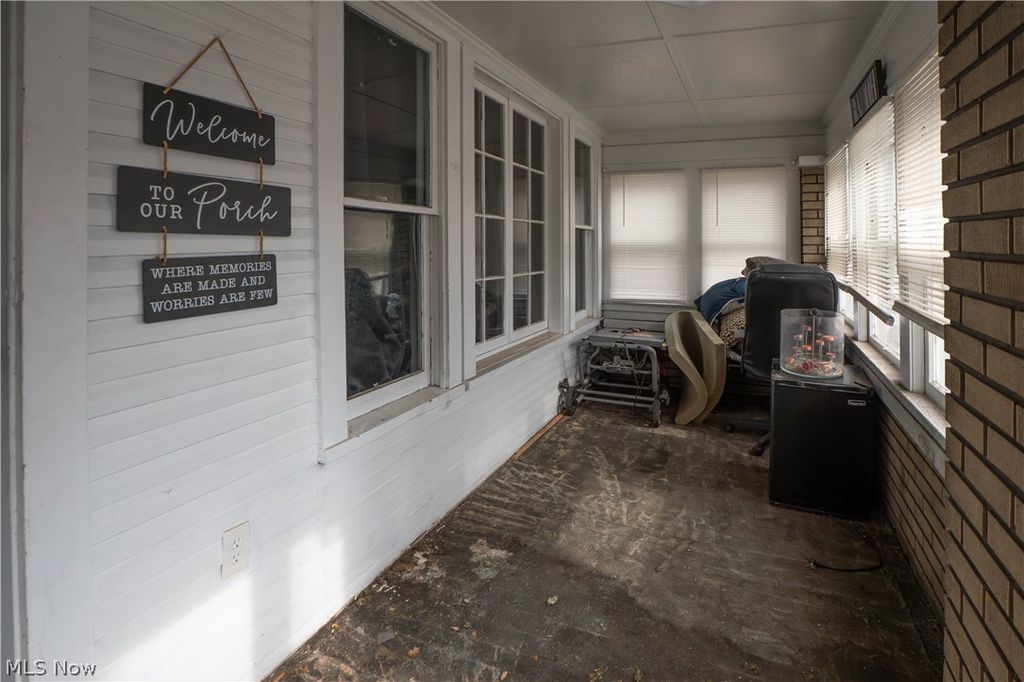 Photo of 557 W Hopocan Avenue, Barberton, OH 44203 (MLS # 5187721)