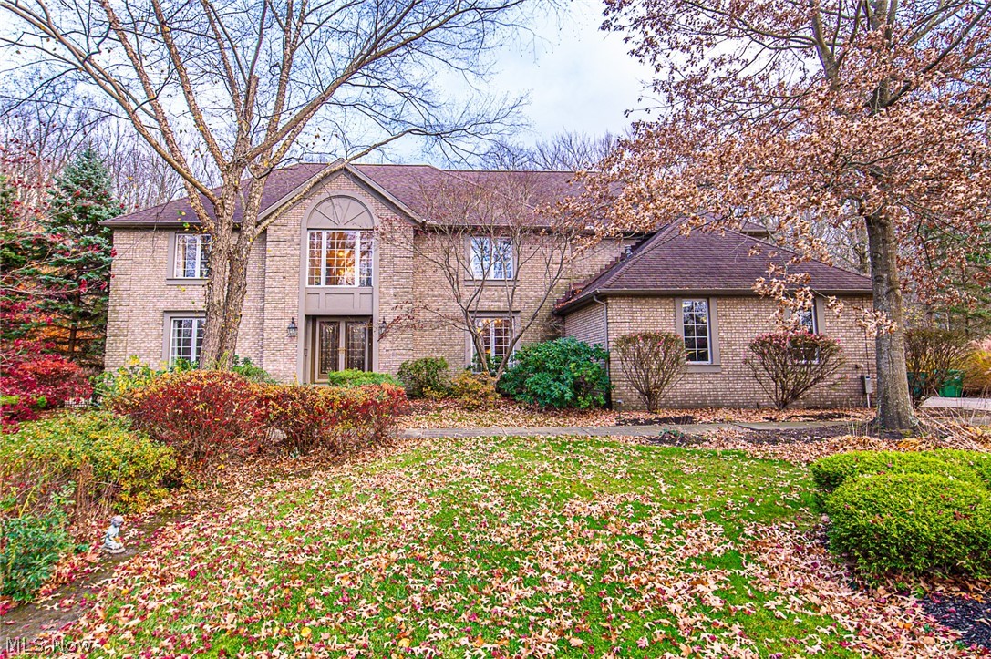 Incredible Nearly 5,000 Sf Custom built Brick Colonial on secluded 2 Acre cul-de-sac. Gorgeous remodeled Designer kitchen with huge breakfast island, stainless steel appliances, granite c-tops, Double wall oven with convection and warming tray. Ceramic tile backsplash plus additional cabinetry with built in wine rack. Breakfast nook with sliders that lead to nice paver patio, pool and huge private backyard. Sunroom features cedar lined vaulted ceilings with double skylights. 1st floor full bath great for pool access. Family room offe Kitchen w/ brick Gas fireplace. Formal Dining rm plus Living room with French doors could be a nice office. 2nd floor features Master with his/her closet, remodeled master bath with his/her vanity, custom ceramic tile glass shower and jacuzzi. Additional 4 bedrooms up plus bonus room or loft that could be in-law suite with private bath and back stairwell for private entry. Lower level has a built-in movie theater with a built in projector and screen with surround sound, bar with mini fridge, billiard and poker room. Newer items include 2 central air & 2 furnaces both within the last few years, heated in ground pool (liner is 2 years old), HWT (6 yrs old), lawn sprinkler (never used), security system, landscape lighting and heated 3 car garage. This home is Loaded and a Must See!