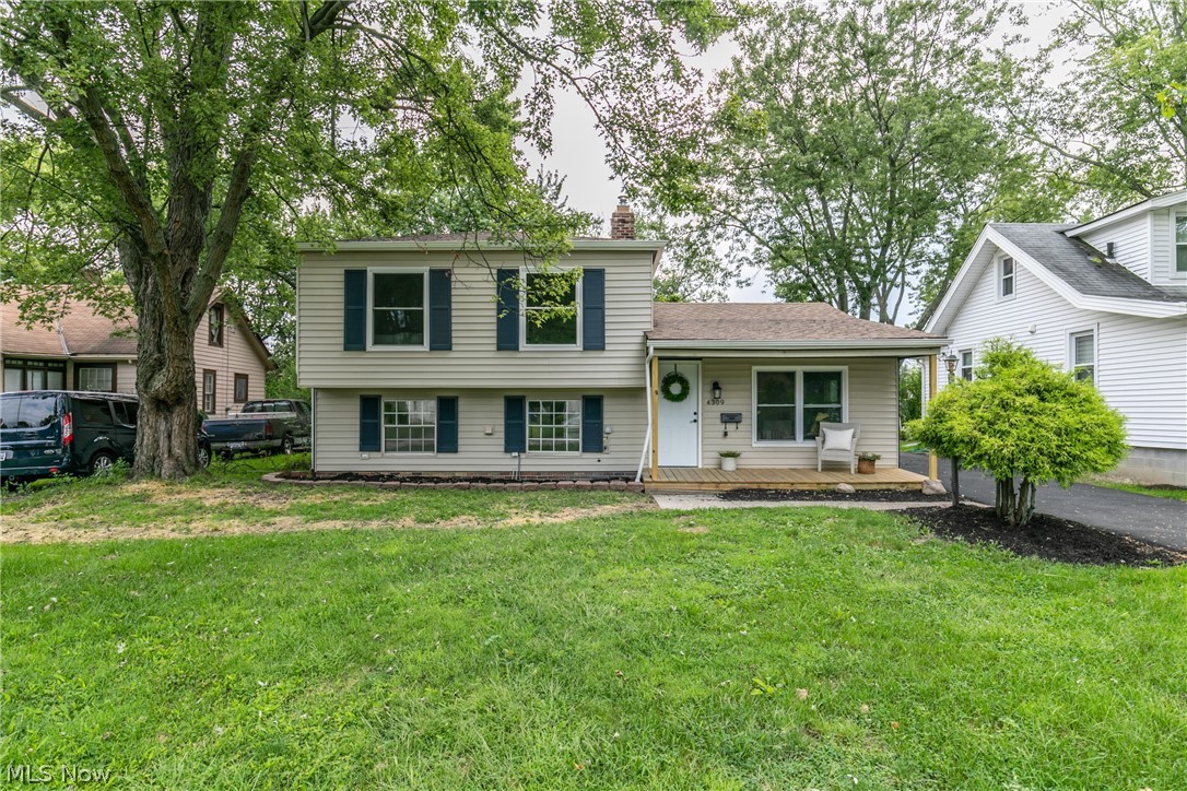 Welcome to this BEAUTIFUL move in ready split level in Fairview Park! This house has been updated and is waiting for you to call your home! Stunning flooring throughout the living, kitchen, and dining area. The living room is spacious with a ton of natural light that opens into the kitchen. The kitchen boosts white cupboards, stainless steel appliances and amazing granite countertops. Off the kitchen is a large dining area with a sliding glass door to the enclosed porch. This area is perfect for entertaining! Down from the kitchen is a lovely little sitting area with a remarkable whitewashed fireplace. Also the lower level has an updated full bathroom and nicely sized room with an attractive chair rail throughout it. The upstairs has three nicely sized bedrooms with all new carpet. Come check out this home today!