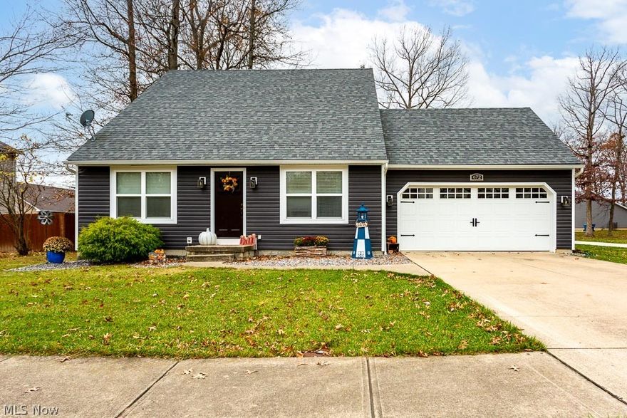 This home is a stunner! Completely remodeled inside and out! There's everything to love about this house! Vaulted ceilings, first floor master bedroom, wooded views, finished basement, 3-4 bedrooms, and giant privacy fenced yard. Enter the home into the Great Room that boasts a vaulted ceiling, new luxury vinyl plank floors, and suspended ceiling fan. The views of the custom kitchen and dining area pull you in from here. Gravitate into the large dining area and luxury kitchen with Cherry cabinets from floor to ceiling, quiet close doors, and beautiful quartz countertops. New stainless appliances, recessed lighting, and solid surface floors complete the kitchen. Elegance continues into the humongous first floor master bedroom, with vaulted ceiling, suspended ceiling fan, and spacious walk-in closet. Remodeled full bath on the first floor has tile floors, new vanity, granite countertops, and new fixtures. Mission-style interior doors throughout, give this home an elegant and rich feel. T