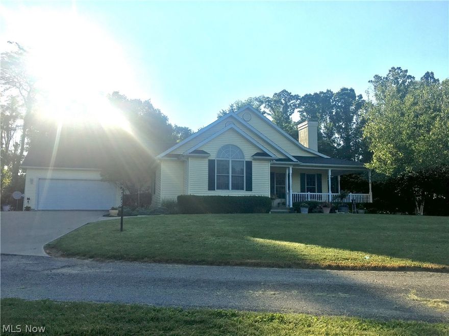 Lovely, well maintained, custom built home. The kitchen is splendid with oak cabinetry, built in appliances, and island with sink for large amounts of counter space. The living room area is large with decorative pillars and a lovely electric fireplace. Enjoy the feel of the fire with no mess. The master bedroom is large and beautiful and has an extremely large walk in closet 18' long. The master bath has a large soaking jet tub trimmed in oak along with his and hers dual sinks. There is a nice closed in sun room off the back of the home along with plenty of outdoor porch space to set in your favorite spot. The basement has much potential with very high ceilings and is plumbed for another bath. This home also offers a water manifold system, insulated siding, and a generator in the event there is a power failure. Call to schedule your showing today.