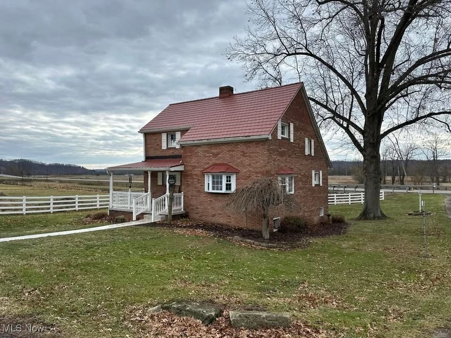 Welcome to your dream country retreat!  This charming 3-bedroom brick bungalow, nestled on a sprawling 16 acres, offers the perfect blend of modern comfort and rustic charm. Step inside to discover a beautifully updated kitchen and bath, designed for both functionality and style. Enjoy serene views of the picturesque stocked pond , perfect for fishing and relaxation.

The property features a spacious barn with stables, ideal for horse enthusiasts or hobby farmers, along with two detached garages providing ample storage for vehicles and equipment. Located close to Tappan Lake, you can easily enjoy outdoor activities while still benefiting from the conveniences of city living just a short drive away.

Surrounded by lush greenery and the tranquility of country living, this home is a rare find for those seeking space, privacy, and a peaceful lifestyle. Don’t miss this opportunity to own your slice of paradise! Schedule a showing today and experience all that this remarkable property has to offer.