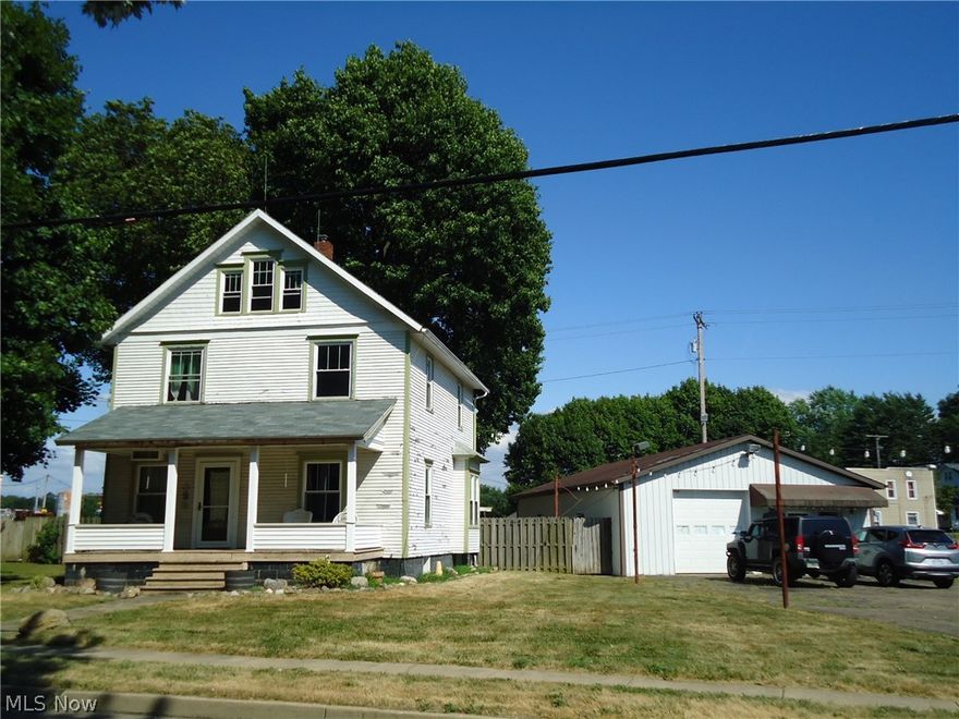 Opportunity knocks!   Unique property with many possible uses.   Zoned B-2 General Business District.    This property consists of  4 separate structures on 2 lots (over 1/2 acre).
A 3 BR / 2 BTH / 1700 s/f  Charming Century home loaded with natural woodwork/floors.----- a 1440 s/f building/garage with office / auto lift/ and heater....previously used as auto sales & service business---- & a 576 s/f garage/pole building and separate garage.....perfect for storage of boats, motorcycles, equipment or supplies. 
Great high traffic location south of downtown Hartville with plenty of parking.........ideal for a multitude of income producing businesses.
Call today for your private viewing or more details.