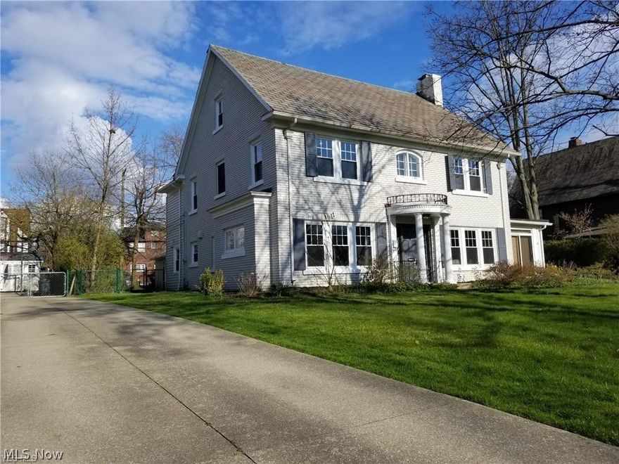 This Spectacular brick, Center hall Colonial in the most prestigious and desirable part of Shaker Heights features 4 bedrooms and 3.5 baths.  Over 3,400 sq ft of living space, an open, inviting floor plan, and a gorgeous dream kitchen with a huge center island and beautiful, up to date bathrooms, this home is just waiting for a new owner!  Beautifully restored hardwood floors throughout. Bright and spacious living room has a pair of built-in bookshelves around a cozy fireplace. Living room also features wide crown molding and it opens to a very spacious family room with built-in shelves and glass sliders that open to a large rear patio. The family room also opens to a sun room/studio that also can be used as a personal training room, but could be an ideal office or play room. The dining room also has extra wide molding and features a built-in serving counter and inglenook, which is ideal for a sideboard. First floor laundry room. There are 3 bedrooms and 2 full baths on the 2nd floor.