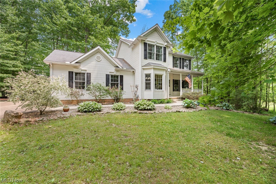 Welcome home to this beautiful newer Colonial situated on a private lot in Atwater! Inviting front porch leads to the airy vaulted foyer. This home is built for modern entertaining with an open floor plan feel and high ceilings throughout. Formal dining room to the left and spacious great room with a fireplace to the right. The well appointed eat in kitchen offers plenty of counter space and opens to the great room and to the spacious deck out back. First floor comes complete with a half bath and first floor laundry/mudroom off the attached 2 car garage. Upstairs you'll find a spacious master bedroom suite with large walk in closet as well as bright and sunny master bath with great counter space, garden tub and separate shower. 2 additional bedrooms and a full bath complete the second floor. Tucked away off the street, outdoors offers privacy with both open spaces and mature trees. The lower level has tall ceilings and full sized windows providing an opportunity for a 4th bedroom