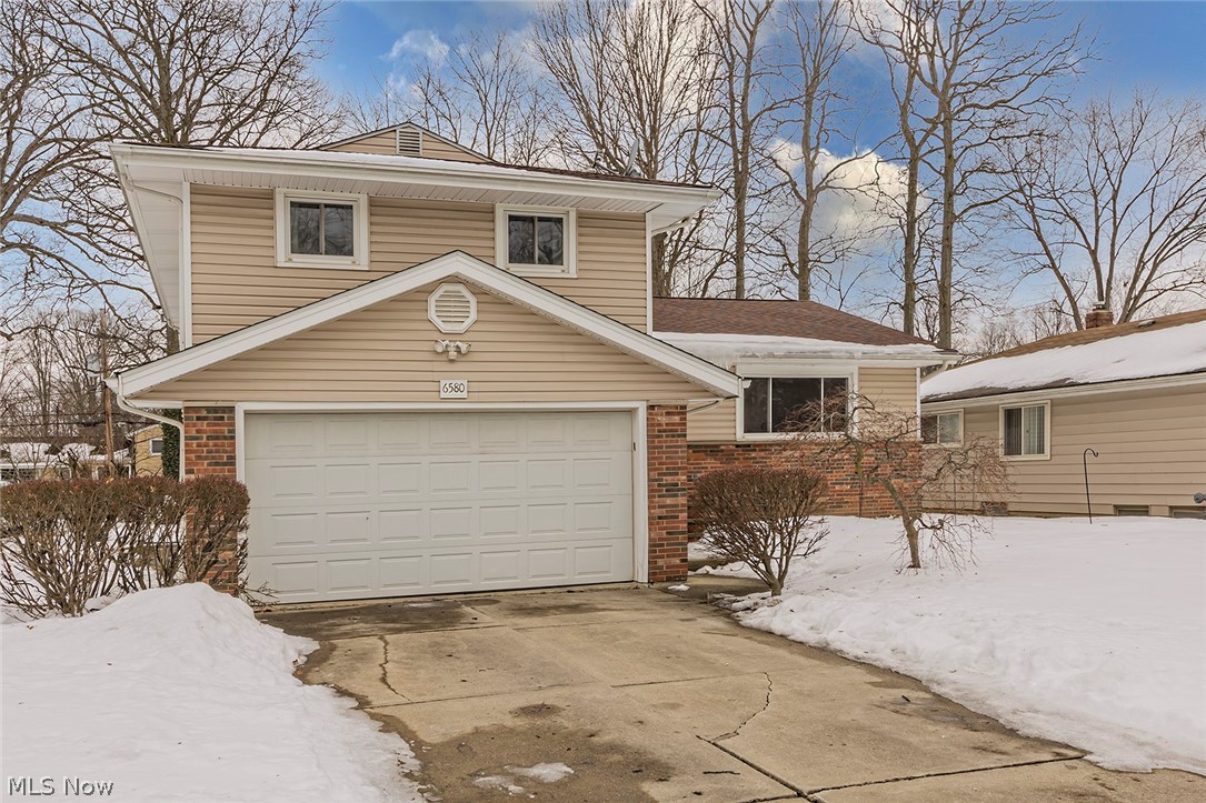 Charming and nicely upkept home in the highly desirable Solon area. Centrally located this home has a newer roof, siding and windows. Large living room with originally hardwood floors lead into a large dining room with ample space for a family gathering. Eat-in kitchen overlooks a family room with a custom marble fireplace and access to the oversized, fenced-in yard. Upstairs are 3 generous bedrooms , full bath and ample closet space. Finished basement makes for a great additional living space with easy access to a recently remodeled full bathroom. With a touch of paint, this home will bring memories you will cherish for years to come!