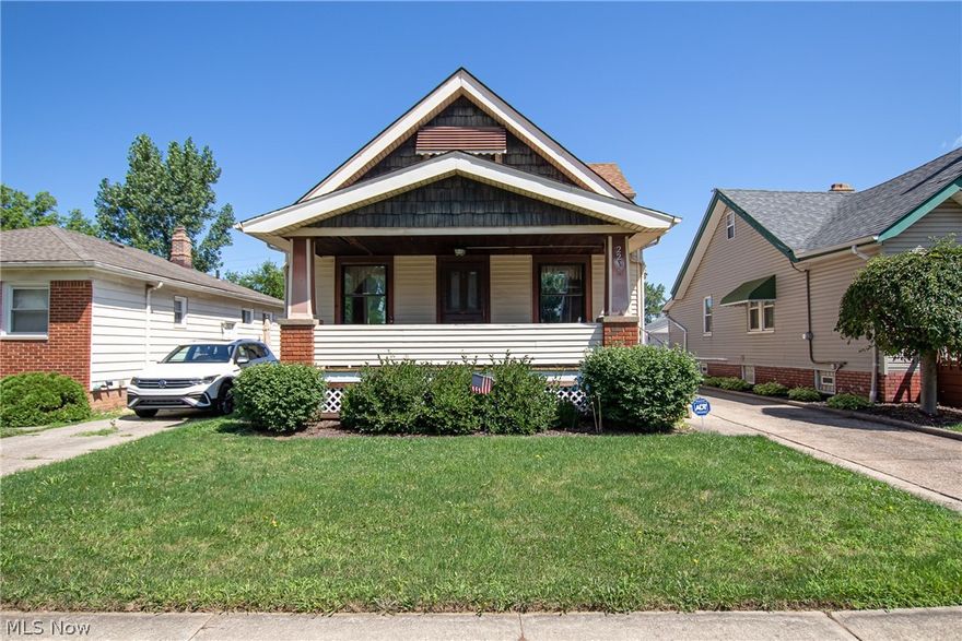 This Parma Bungalow offers 1,620 sq ft of living space and features 4 bedrooms and 1 full bath.  Upon approaching the home you are greeted with a large covered front porch perfect for relaxing in the evenings on a porch swing. Once inside the home, notice the lovely arched entryways and crown molding in the living and dining room.  There are original hardwood floors in the living and dining rooms plus in the hallway, and both bedrooms just waiting to be uncovered.  The formal dining room off the kitchen features a lovely built-in china cabinet with lead glass doors, storage space, and a window seat.  The eat-in kitchen offers ample counter space and cabinets and an additional dining area.  Off the eat-in area is the family room with access to the fenced backyard and an oversized two-car detached garage that has additional storage space. Completing the first floor are two bedrooms and a full bath.  Upstairs is completely finished with knotty pine walls and offers two additional bedrooms