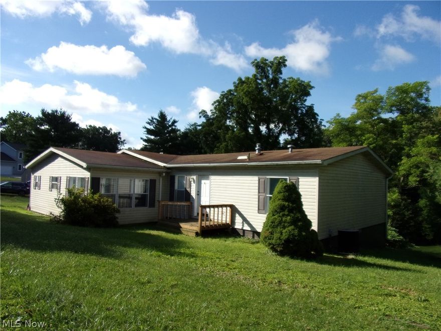 Nice country setting. Detached 24x24 garage. Enjoy sitting on the deck in the evening watching the animals play.