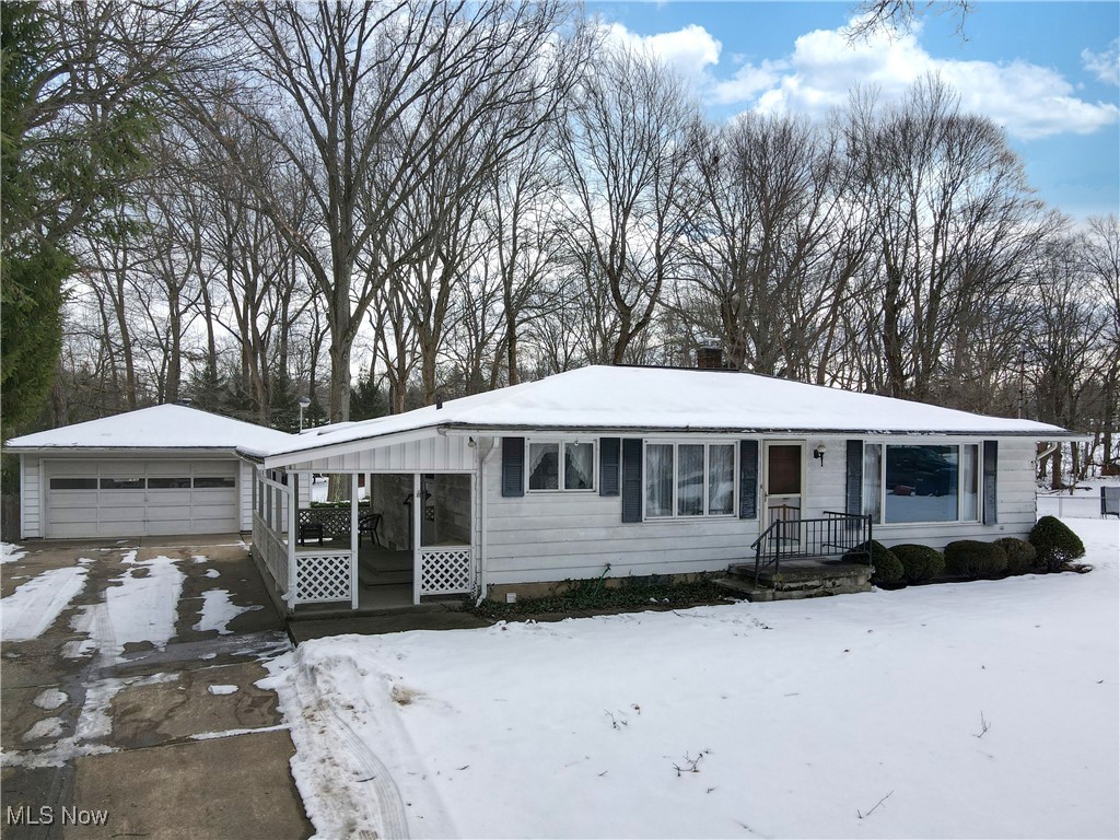 Welcome home to this peaceful ranch in the heart of Green. Minutes from the highway and sitting in Green local schools. Tucked back on a quiet street you will find this charming home with a sprawling backyard. Home has a lot of character and boasts original hardwood floors under all carpet and exposed in 2 of the 3 bedrooms. Full Bath's on main and lower level. Septic replaced in 2013. Roof from 2008. The two car garage features a wood burning stove. This home has been maintained and is ready for your personal touches. Contact your favorite realtor today for a tour.