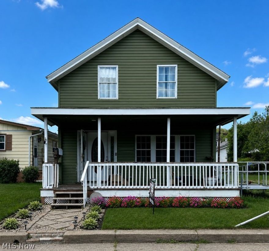 Situated in the highly sought-after Wellsville school district, this impressive two-story home offers three bedrooms, one bathroom, and a spacious living room area that flows effortlessly into a kitchen equipped with ample counter space, refrigerator, stove, and dishwasher. The first floor features a full bath and laundry facilities for added convenience. Three generously sized bedrooms await on the upper level. The expansive backyard, ideal for entertainment, is vinyl fenced and right along the Ohio river. Don't miss this opportunity - schedule your showing today and make this house your dream home, weekend getaway, or your next investment! Sellers are motivated!