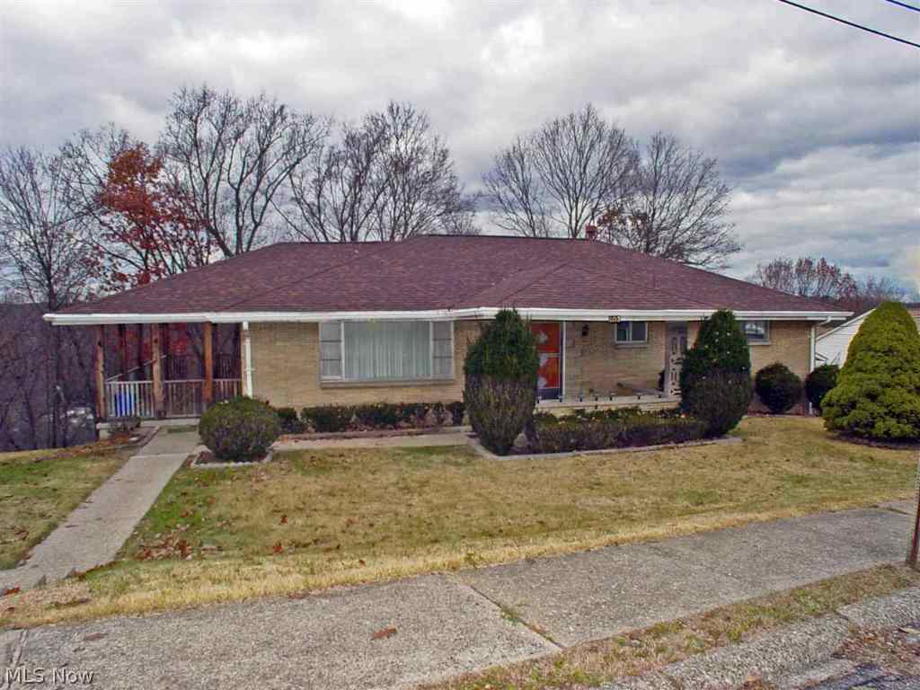 Convenience & quality in this nice 3 BR brick ranch w/full basement that includes rec room & 2nd kitchen, updated Baths, new furnace, new flooring throughout, freshly painted. Move-in condition. Private, back, large covered side porch. One car integral garage plus 2 car det. garage. Home Warranty included.