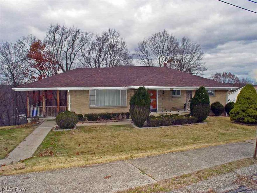 Convenience & quality in this nice 3 BR brick ranch w/full basement that includes rec room & 2nd kitchen, updated Baths, new furnace, new flooring throughout, freshly painted. Move-in condition. Private, back, large covered side porch. One car integral garage plus 2 car det. garage. Home Warranty included.