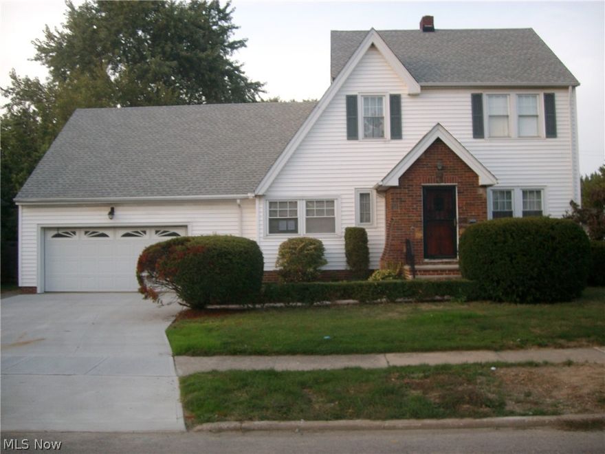 Spacious 4 bedroom, 2.5 bath colonial on a great street.  Huge master bedroom and spacious floor plan.  Updated kitchen has a family room off of the eating area.  Features include: hardwood floors, rec room, attached 2 car garage , newer painted, appliances, newer furnace/AC, updated driveway, fenced yard, stamped concrete patio, large backyard with a basketball court, etc...  Violation free, home warranty, well maintained, convenient location!  Move right in or update to your taste.