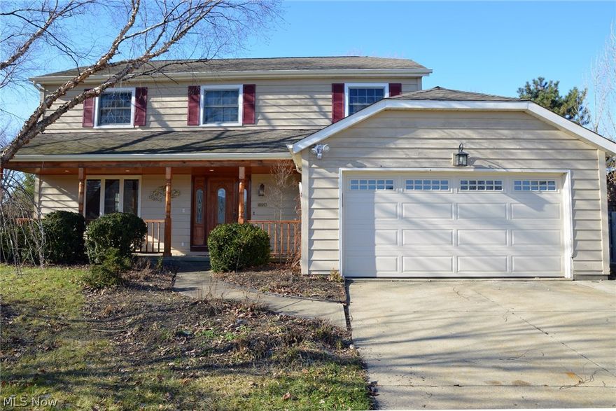 Warm and spacious five bedroom home.  Beautiful hardwood oak floors throughout the home.  Never used appliances.  One-of-kind family room with built-in bookshelves.  Finished basement.  Two first floor porches, and one upper-deck.  Newly renovated laundry room and pristine garage.  This one-of-kind Strongsville home is move-in ready.