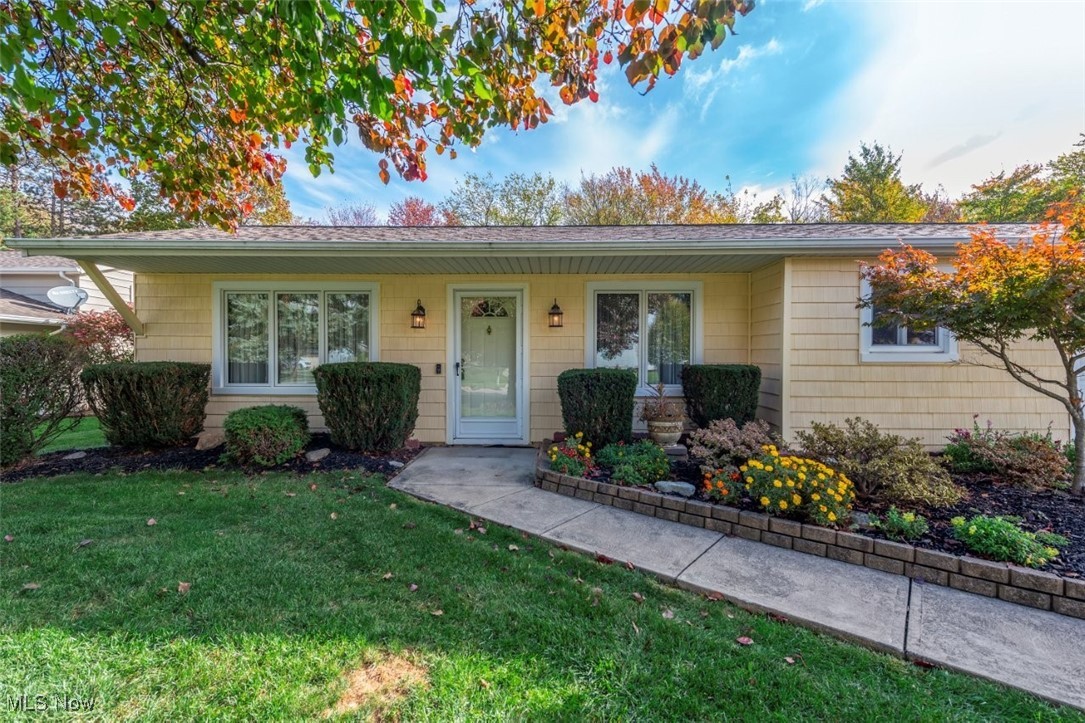 Beautifully Maintained Traditional Split-Level Home in Strongsville.   Welcome to this well-cared-for and thoughtfully maintained split-level home, offering comfort, charm, and peace of mind with numerous updates throughout.    The main level features newer (2013) engineered hardwood flooring, a spacious living room filled with natural light, and a formal dining area. The updated kitchen (2013) provides ample cabinet space and a cozy eat-in area with patio doors leading to the fully fenced backyard, complete with a paver patio and peaceful surroundings.  Plenty of yard to play, garden, relax, and more.  A truly enjoyable and peaceful space. The first floor offers a nice flow between the living, dining, and kitchen spaces, creating a comfortable and inviting layout.   An attached two-car garage includes an incredibly convenient man door providing direct access to the backyard.   The lower level offers a generous family room with a beautiful brick fireplace (converted to gas in 2016), a half bath, and a large unfinished area ideal for laundry, storage, or a future workshop.  Upstairs, you’ll find three comfortable bedrooms and a full bath.  Enjoy peace of mind with major updates already completed:  Stanek windows throughout (early 2000s); Pella dining room windows replaced in recent years (2022 approx).   Furnace, A/C, and hot water tank (2012), Roof (2017), Kitchen cabinets and engineered hardwood floors (2013).   Lovingly maintained by its current owners, this home is truly move-in ready and waiting for you to make it your own!
