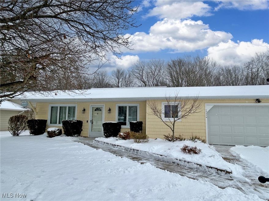 Beautifully Maintained Traditional Split-Level Home in Strongsville.   Welcome to this well-cared-for and thoughtfully maintained split-level home, offering comfort, charm, and peace of mind with numerous updates throughout.    The main level features newer (2013) engineered hardwood flooring, a spacious living room filled with natural light, and a formal dining area. The updated kitchen (2013) provides ample cabinet space and a cozy eat-in area with patio doors leading to the fully fenced backyard, complete with a paver patio and peaceful surroundings.  Plenty of yard to play, garden, relax, and more.  A truly enjoyable and peaceful space. The first floor offers a nice flow between the living, dining, and kitchen spaces, creating a comfortable and inviting layout.   An attached two-car garage includes an incredibly convenient man door providing direct access to the backyard.   The lower level offers a generous family room with a beautiful brick fireplace (converted to gas in 2016), a half bath, and a large unfinished area ideal for laundry, storage, or a future workshop.  Upstairs, you’ll find three comfortable bedrooms and a full bath.  Enjoy peace of mind with major updates already completed:  Stanek windows throughout (early 2000s); Pella dining room windows replaced in recent years (2022 approx).   Furnace, A/C, and hot water tank (2012), Roof (2017), Kitchen cabinets and engineered hardwood floors (2013).   Lovingly maintained by its current owners, this home is truly move-in ready and waiting for you to make it your own!