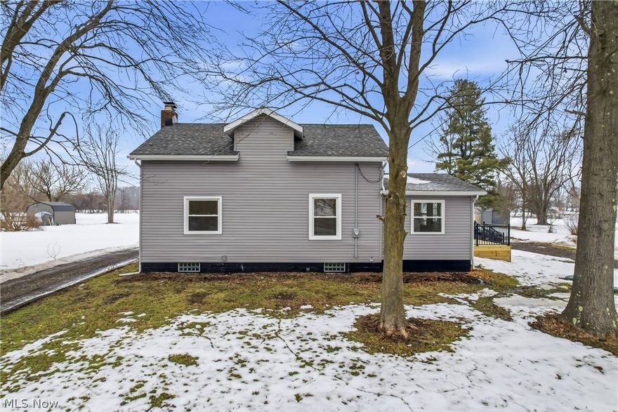 Welcome Home ! Just move into this updated 1.5 story home. Vinyl sided exterior & large wrap around deck. Enjoy cooking in the totally remodeled kitchen w/white cabinetry & gold colored accessories & stainless steel range/oven , stainless microwave, stainless steel side by sid refrigerator, & quartz countertops, recessed lighting, & pass-through or breakfast area in family room area. Living room features brick wood burning fireplace w/raised hearth. Large new 2+ car garage (22 X 32). New & updated items include: Hot water tank, well pump, well storage tank, new tile bathrooms, plumbing, electric panel, vinyl plank flooring, carpeting, new trim throughout, new kitchen appliances, exterior & interior lighting. Newer items include:, roof , vinyl clad windows, vinyl siding. Gas force air heating & central air. Large lot (irregular lot). Large closets in upstairs bedrooms Block windows in the basement.