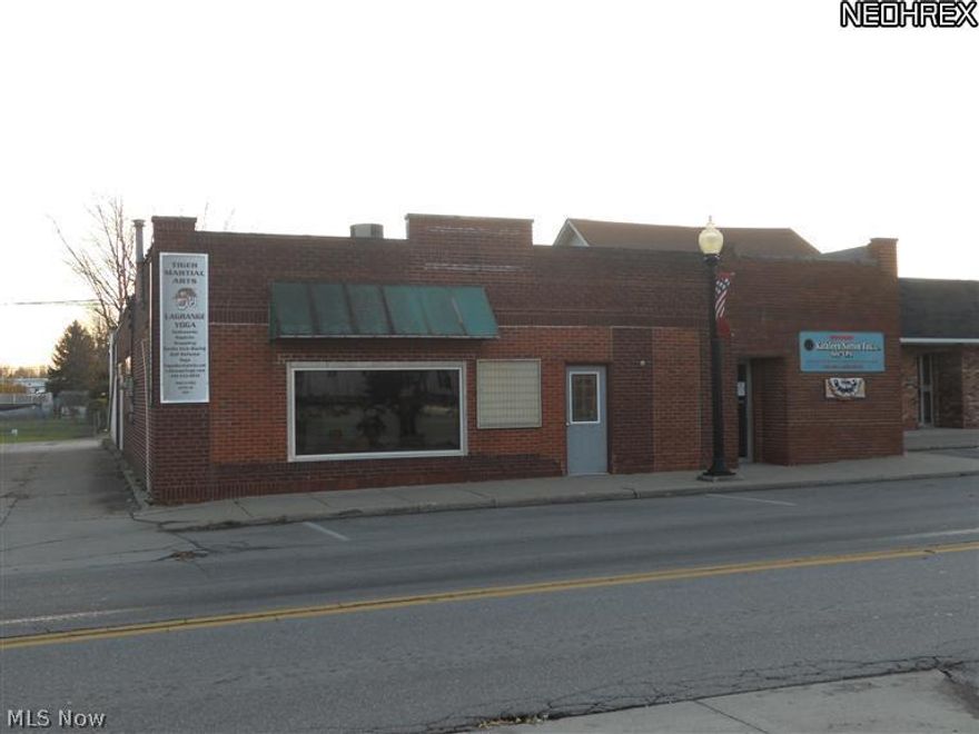 Located in the heart of Lagrange this commercial building could be used for a lot of different businesses. Over 4,500 SqFt and is currently set-up for an attorney & accountant's offices with a large open area that was last used as a gym/workout area. There are 4 baths! Heating and A/C systems have been updated. Roof was updated in 2011 with a warranty. Just 5 minutes to Route 10/480.