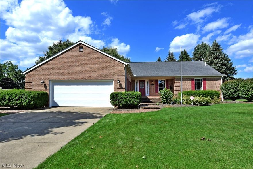 Welcome home to this beautiful 3 bedroom, 3 full bath brick ranch on a dead end street in a tucked away neighborhood in Howland schools. This one owner home was built in 1986 you will be amazed by the room sizes and the quality of work. The 2 car, concrete driveway leads to a matching, attached garage. Enter through the garage into a large laundry room or the front entrance to a large foyer. The immense, eat-in kitchen features beautiful solid wood cabinets with a bay window. The beautiful dining room has an elegant chandelier and allows for more intimate dining. Follow through to the tremendous living room highlighting sliding glass doors that lead to a large deck, a beautiful brick mantle and gas fireplace. Enter the all season room from the living room or the sliding glass doors from the master bedroom promoting windows all around and even more sliding glass doors to the outdoor deck space. Take the long hallway to the master suite featuring a walk in closet, dressing table and very