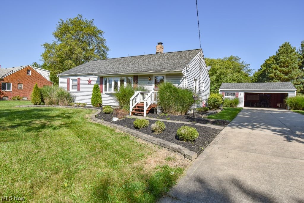 Welcome to this cozy 3 bedroom ranch nestled into a quiet neighborhood, just minutes from shopping, food, and entertainment. Enjoy your own little piece of heaven on almost 3 acres with open yard and wooded escape. Rear side of roof has heaters to melt snow! Large wooden back deck that has roll out awning and a fixed natural gas grill. Stepping down to the beautiful stamped concrete patio with a built in fire pit. Fresh partially finished basement that would be perfect for entertainment. Truly a beautiful property that won't last long!