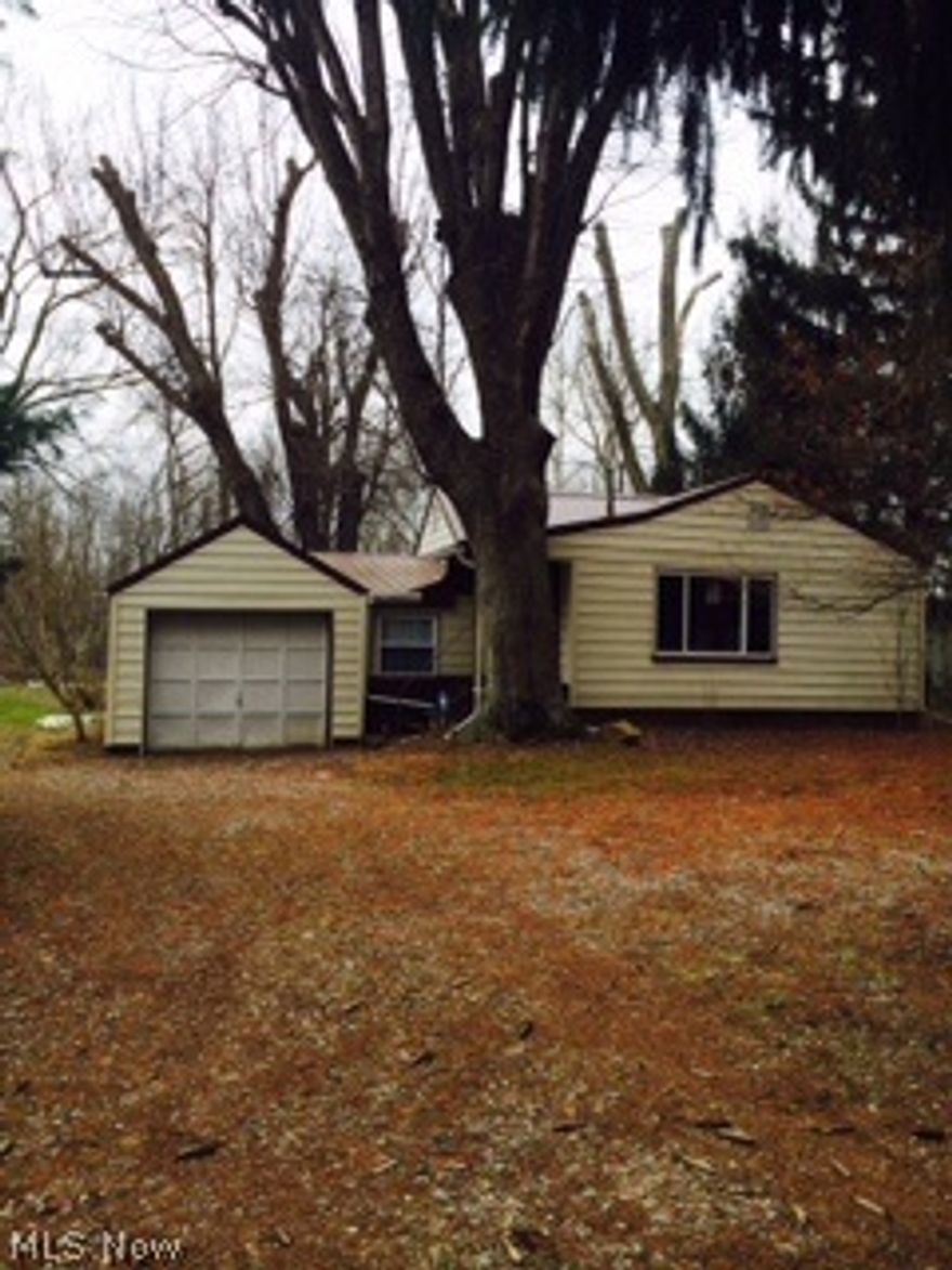 River frontage. Updated home on Killbuck creek. This two -three bedroom home has been updated through out, located on a paved road. It is in the floodplain.