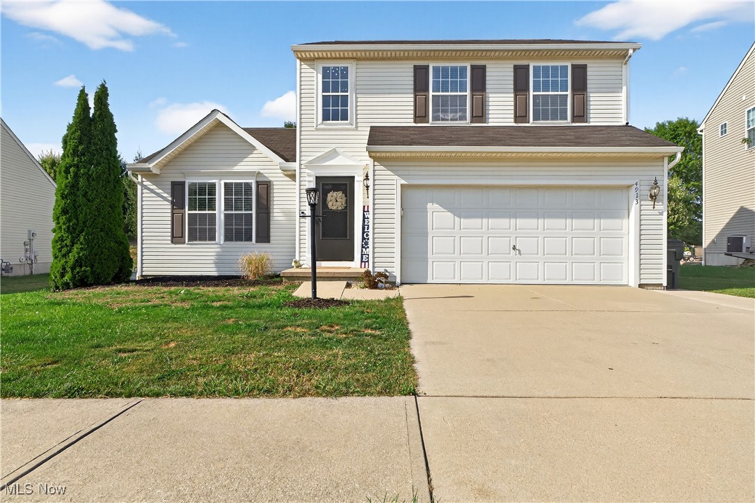 Welcome to this MOVE-IN READY updated colonial in the Autumnwood Development on a cul de sac street. The open floor plan begins in the comfortable great room with a vaulted ceiling, newer LVT flooring and today's neutral decor. The well equipped kitchen has stainless steel appliances including a gas range, microwave, refrigerator and dishwasher. The countertops are a cool stainless steel finish and the newer backsplash completes the look. The dining area has a sliding glass door to the spacious yard and the breakfast bar is ideal for casual dining. The back hallway has a convenient powder room and cubbies for additional storage. Three bedrooms are found on the second floor including the primary bedroom with soft wall to wall carpeting, a ceiling fan, 7x6 walk-in closet and private bath with a step-in shower. Two additional bedrooms share the hall bath an also have carpeting, ceiling fans and generous closet space. The recently finished lower level is ideal for recreation, exercise and hobbies with newer LVT flooring, painted trusses for an industrial vibe and plenty of storage. The laundry is found here with the washer and dryer included. The spacious back yard has a cement patio and plenty of room for outdoor activities. Don't miss this opportunity to make this your home!