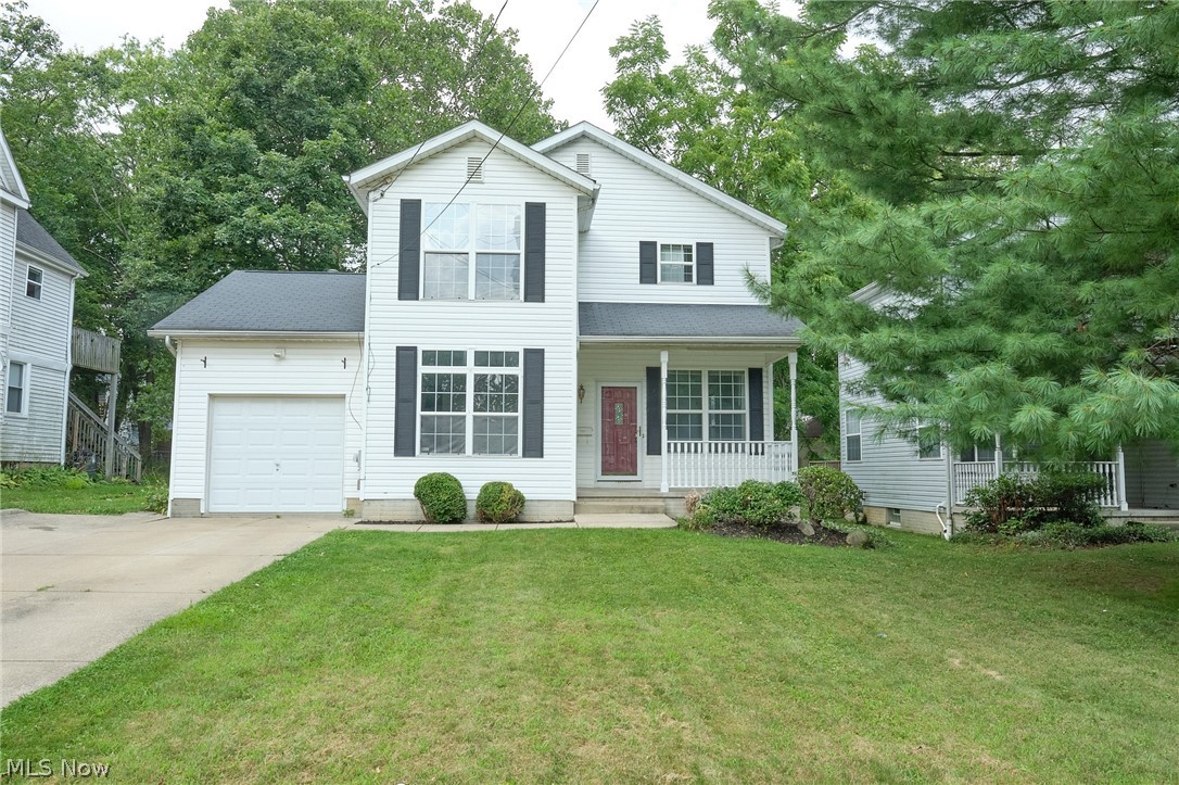 Welcome home to this charming newer home near Highland Square. The inviting front porch enters into a spacious living room that features new laminate flooring in the entry and new carpet and paint throughout the living room and dining room. The kitchen has a new over stove microwave installed as well and new laminate flooring. Upstairs you will find an ample owners suite with a sizable closet and private bath as well as 2 more bedrooms and a second full bath. Back downstairs the living room slider walks out onto an wood deck overlooking a ample back yard. New carpet has been installed throughout as well as fresh paint. All Appliances in home stay with the new owner. This must see home is ready for you to make your own.