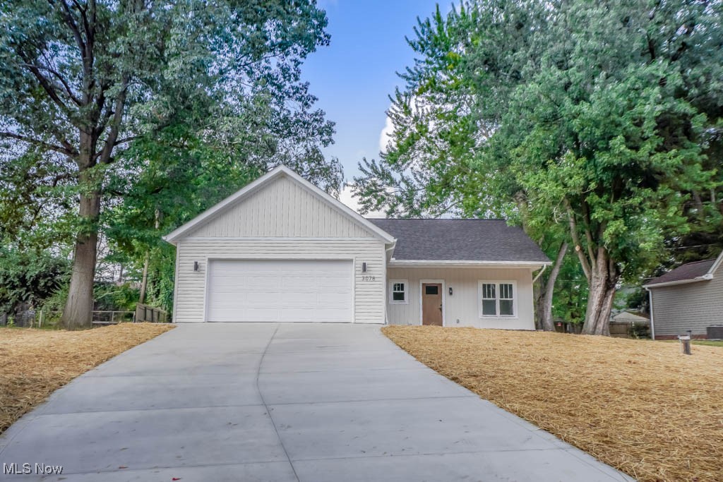 Be the first to enjoy this brand new ranch in a prime location, just minutes from Portage Lakes! The open layout connects the living room, accented by a feature wall, to the beautiful eat-in kitchen with quartz countertops, soft close cabinetry, stainless steel appliances, and an island with counter seating. The master suite offers a walk-in closet and a private full bath with double sinks and a tile step-in shower, while two additional bedrooms share the main full bath with a tub/shower combo. A spacious mudroom and laundry area sits just inside the attached two car garage, which includes a smart garage door opener and attic access to climate controlled storage. A patio in the partially fenced backyard completes this move-in ready home, offering all the benefits of new construction, without the wait. Don't miss out, call today!