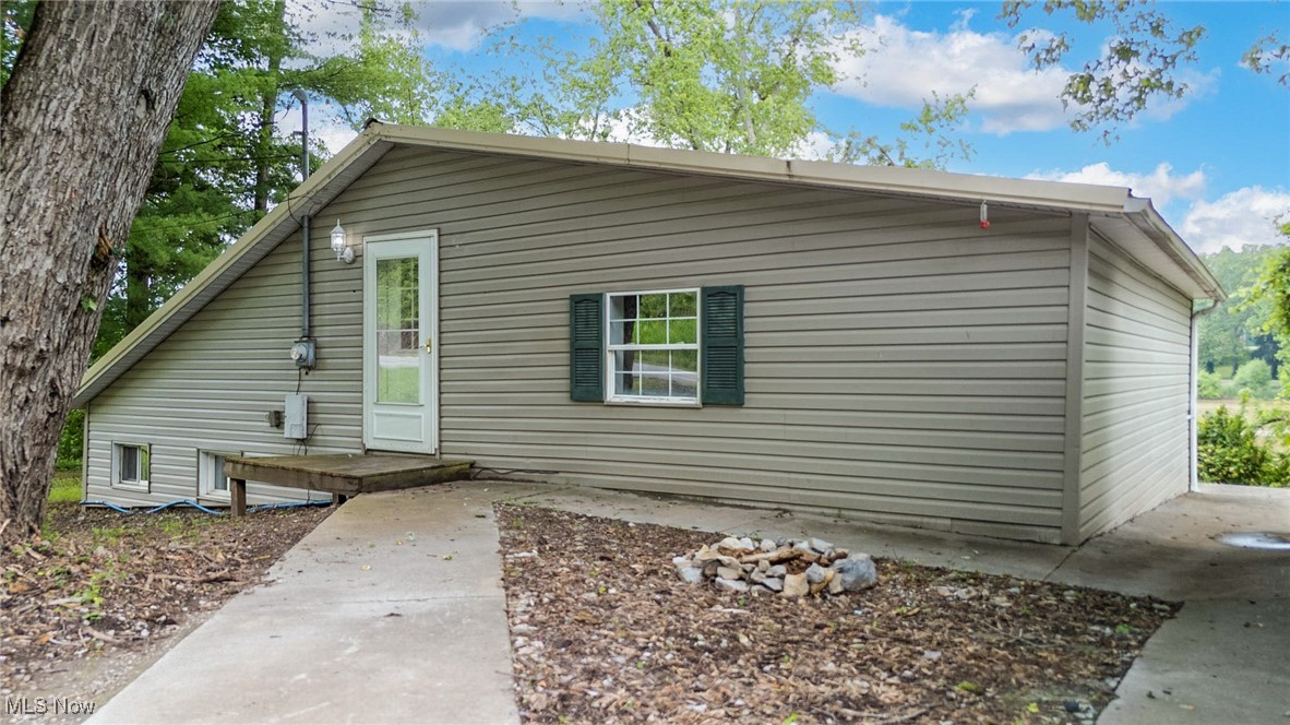 Charming riverfront home on the beautiful Muskingum River! This 2-bedroom property features a newly renovated kitchen including fresh cabinetry with direct access to a large back deck—perfect for relaxing or entertaining with river views. Most of the flooring on both levels has been updated and the property also includes a newer roof! Fresh neutral color paint throughout as well. The detached two-car garage offers plenty of storage, and the private dock makes it easy to enjoy boating or fishing right from your backyard. Whether you're looking for a peaceful full-time residence or a weekend escape, this property offers it all. Set up your showing now!