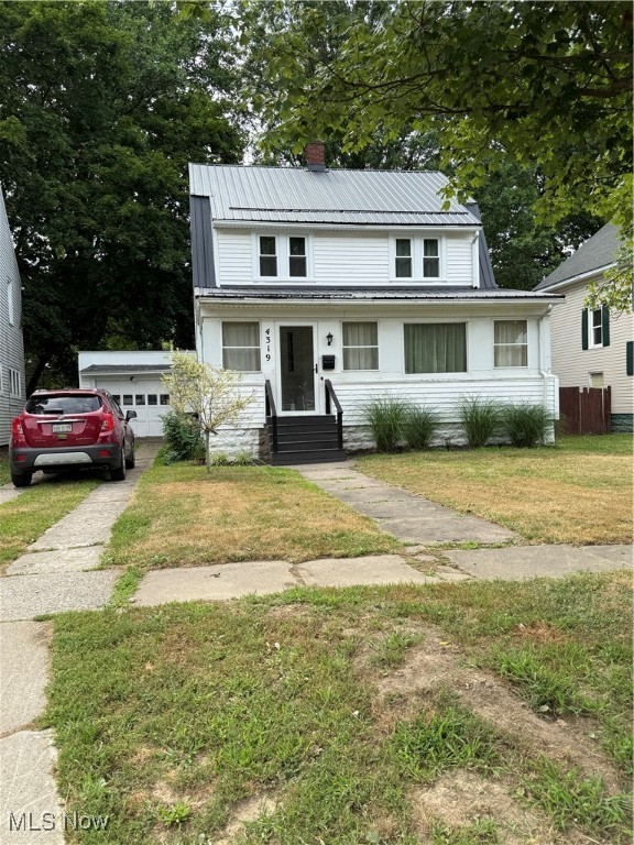 Welcome to this lovely 2 story colonial situated on a quiet street on the east side of Ashtabula. This home boasts a large living room with beautiful oak trim thru out. There is a formal dining room as well as a kitchen with a little nook that could be used for a small table or booth. There are 3 large bedrooms upstairs as well as a full bath up. All the bedrooms have lovely original hardwood floors as well as the dining room. There is a full basement that could be easily finished off into extra living space if needed. You will also enjoy the large enclosed front porch. There is a new furnace and central air and new metal roof. There are also new double hung windows in most of the home. There is vinyl siding plus a one car garage. All the major items have been taken care of and this home is waiting for a new family. This is located close to schools and shopping,