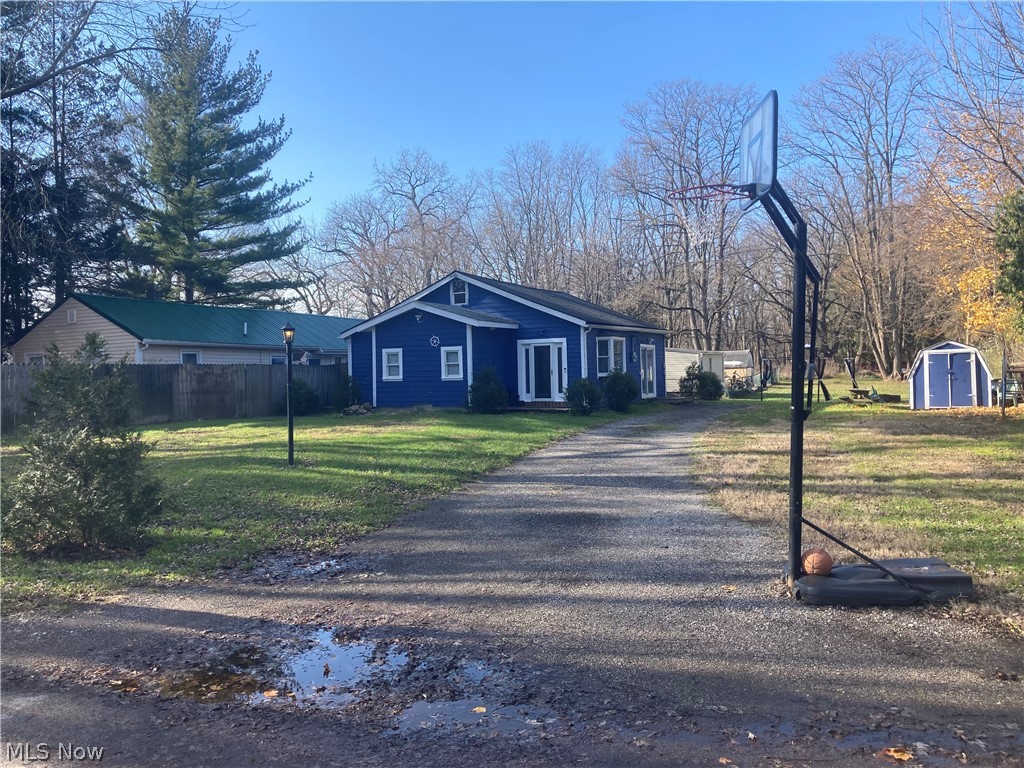 A rare gem in Eastlake! The property is located in a very quiet and secluded area. Enjoy the view of the Chagrin River every time you check your mailbox! A walking distance to Woodland Park & The Chagrin River Park. Many recent upgrades include an updated bathroom, new flooring, fresh exterior paint, (new carpet is being installed soon in the bedrooms).