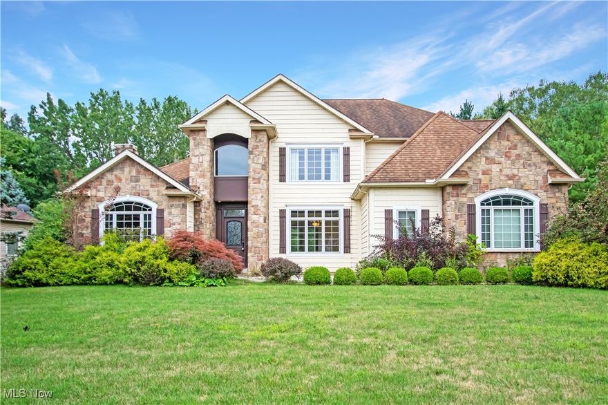 Welcome to this stunning 4-bedroom, 3.5-bath colonial with an attached 3-car garage, offering an ideal blend of elegance and functionality. The main floor features a bright office/den with a cozy fireplace, a 2-story great room with a striking coffered ceiling and a second fireplace that fills the space with warmth and light, and a formal dining room with an elegant trey ceiling, perfect for gatherings. The spacious eat-in kitchen is a chef's dream, featuring a large island, skylights, and direct access to a back deck that overlooks a serene pond, creating a peaceful backyard retreat. Conveniently located off the kitchen is a laundry room. The 1st-floor primary suite is a luxurious haven with a trey ceiling, a third fireplace, a spa-like bath, and an oversized closet. Upstairs, you'll find three additional bedrooms—two of which share a Jack and Jill bath and a third has its own private full bath. The full unfinished walk-out basement offers endless possibilities for customization. Situated in the desirable Ashford Glen community, this home provides access to a range of amenities, including a beautiful pond, a charming gazebo, a grill area, and a walking path, all common property for residents to enjoy. This home perfectly combines comfort, style, and a vibrant community lifestyle.