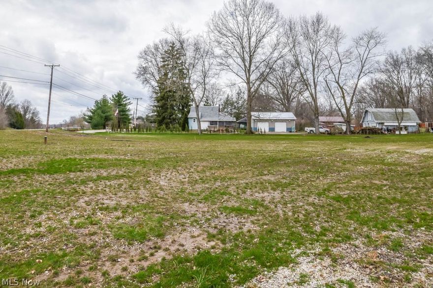 Endless possibilities to build on this 1.18-acre corner lot in Tuslaw schools! With no zoning regulations, this parcel could be the perfect spot for your new home or business.  All utilities are available, including public water tie-in at the street. Great accessibility with frontage on 2 streets, cleared for easy construction, and just minutes from Rte. 30.  Take a look today!