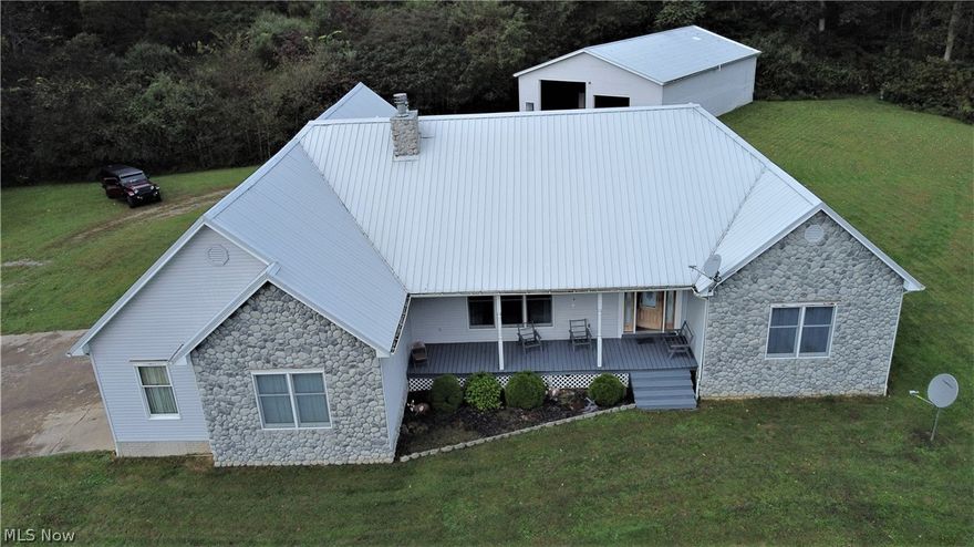 Are you ready for this! A beautiful hilltop setting, Noble Local School district, with 16.51 acres, mineral rights included. This property offers 2001 ranch style home with 2,760 square feet. Four bedrooms, four bathrooms. One side of the home is set up as a mother-in-law suite with its own kitchen, living room, and two bedrooms. There is a stone fireplace in the main living room to enjoy the warmth of those family get togethers. The kitchen has solid oak cabinets and Corian counter tops. Geothermal heat. The Geothermal System was replaced three years ago. Monthly electric and heating bill runs $376 per month on budget. Underground utilities. Poured basement walls, basement is unfinished. There is a fifth room in the basement that could be used for a bedroom. Water softener. Nine foot ceilings throughout the home. There is a jetted bathtub in the master bath and a double sink with Corian counter tops. A 33.08" x 25.04" attached three car garage and a detached 40' x 60' pole barn with a full bath and a special RV discharge pipe for sewer. The pole barn also has a hook up for a wood burning stove. Above ground pool (need liner).