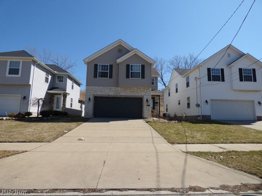 Three bedroom 2 fulll bath home with an open floor plan. Living room with large bay window and gas fireplace. Eat-in kitchen with breakfast bar, full unfinished basement. Two car attached garage. Being sold as is. Buyer assumes city violations. Pre-qualification letter is required, see broker remarks.