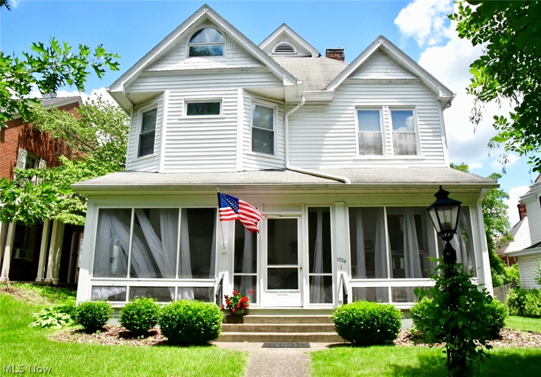 This charming 3 story home offers character that couldn't be replaced for the price! There are 4 bedrooms, 2 baths and a large room in the finished attic that could be used for a 5th bedroom, studio, office or for extra storage space! The screened in front porch is a great place to relax and enjoy the gentle breeze! The main level has beautiful solid oak trim & flooring throughout and the second level has all gorgeous pine flooring. The kitchen has been updated with rich, solid cherry, custom cabinets, granite countertops and stainless steel appliances with a dual fuel oven/range! The large doorways, pocket doors and beautiful staircase leading to the second floor are just a few of the unique features that showcase the character of this early 1900's, Queen Ann style home, which was a very popular architectural style in the United States during that time! It is located in the McIntire Historical District on a brick street! The back yard is surrounded by a cedar fence, great for addition