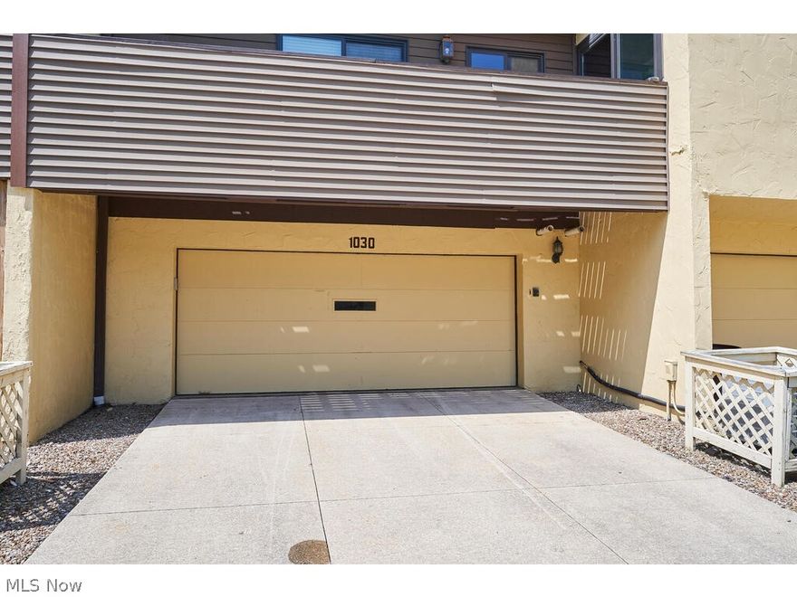 Completely renovated, ground floor, stunning Hampton Ridge condo with 3 bed and 2 full baths in Woodridge Schools.  No surface left untouched and care and attention to detail brings you this move in ready home.  The kitchen has been opened up to the living spaces with a granite bar top. A spacious great room and cozy living room with fireplace and feature wall give you two options to relax after a long day.  Sliding door to patio off the living room. Kitchen features new white cabinetry, new SS appliances, granite countertops and ceramic backsplash.  Convenient bar/coffee station.  First floor master bedroom with barn doors leading the the walk-in closet and bath.  Master bathroom includes custom ceramic shower with custom door, new cabinetry and granite countertop.  A second bedroom on the main floor and additional updated full bath.  First floor laundry area.  Lofted possible third bedroom with walk-in closet, also perfect for an office or theater room.  Renovations include but not l